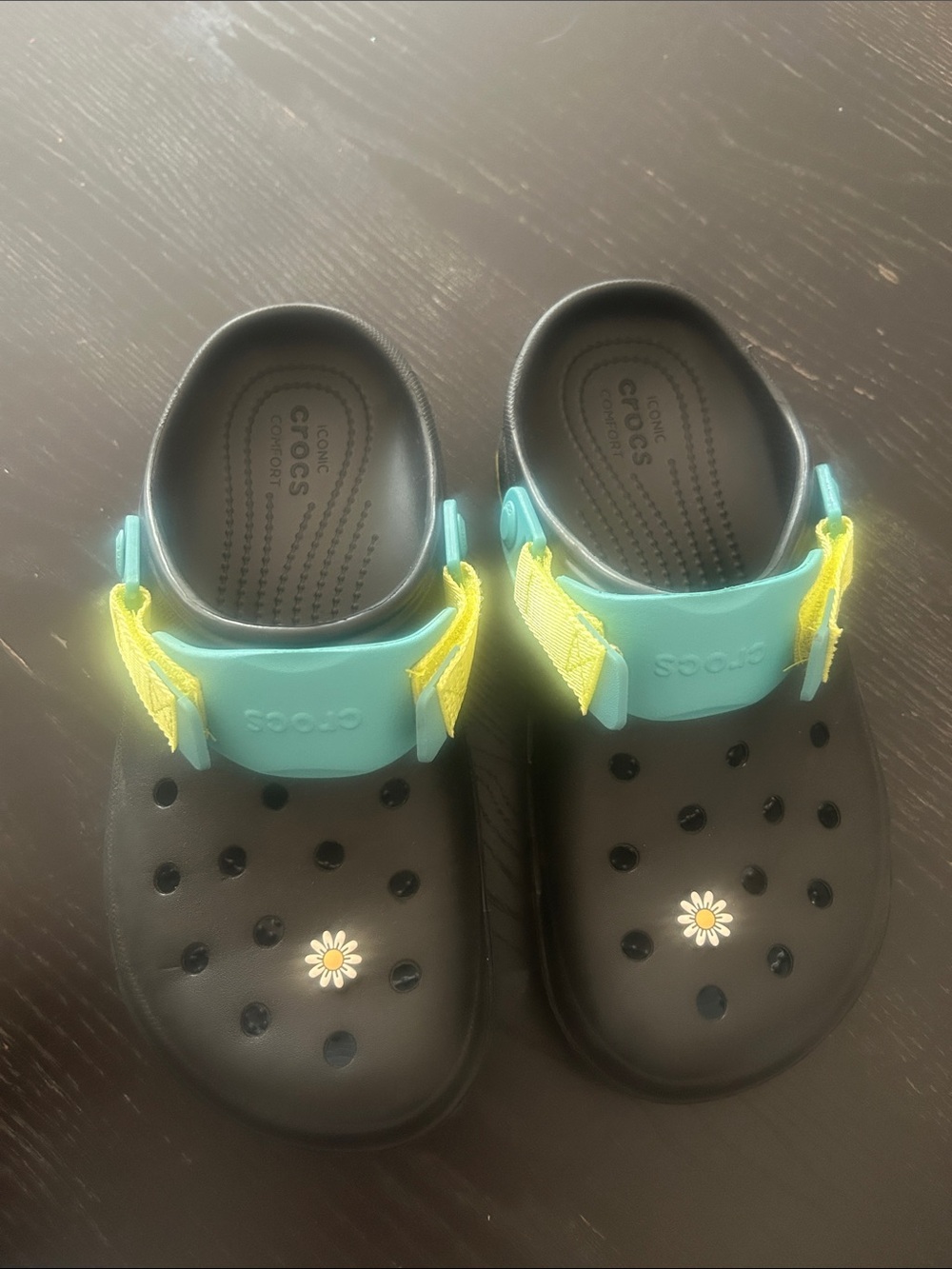 Crocs Black and Teal Clogs with Yellow Accent